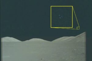 Dark lunar surface and horizon with a yellow geometric overlay (square and tilted rectangle) in the upper-right.